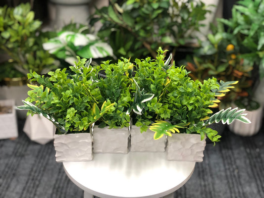 Artificial tropical greenery combo in white decorative pots