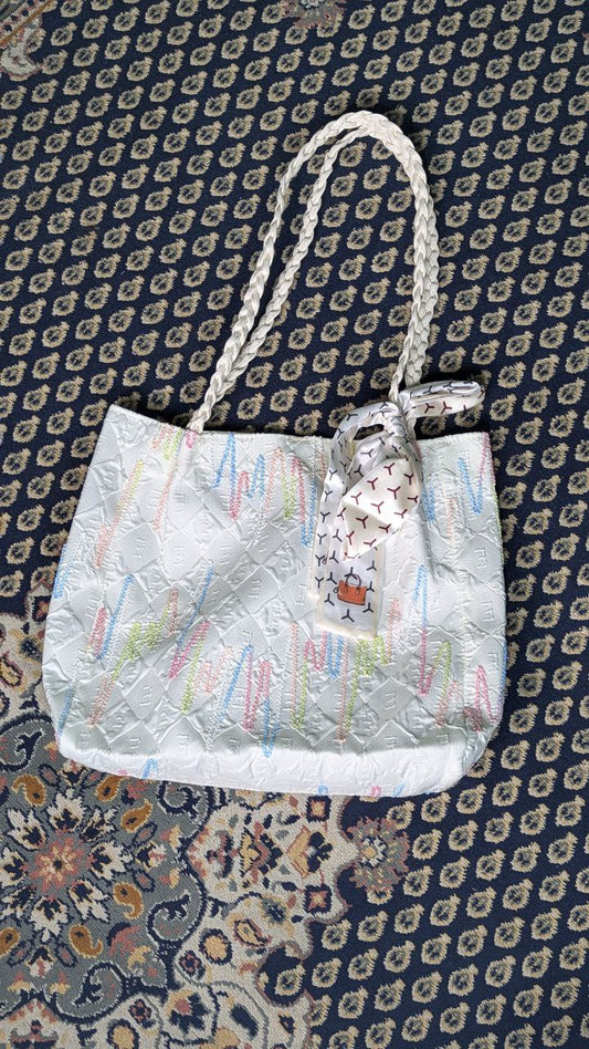 Attire Tote bag