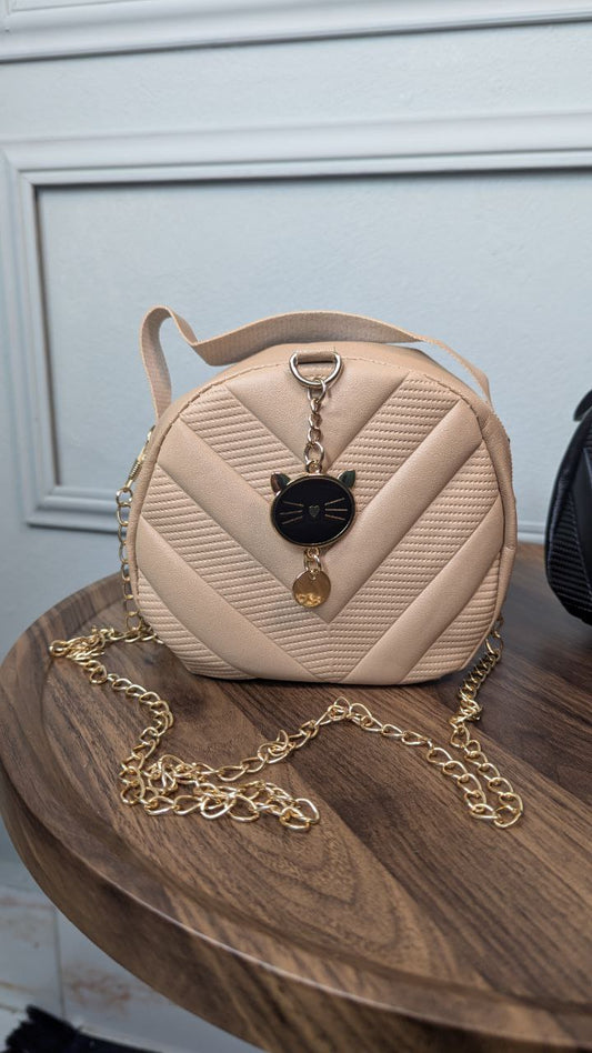 Attire Diagonal Round Bag