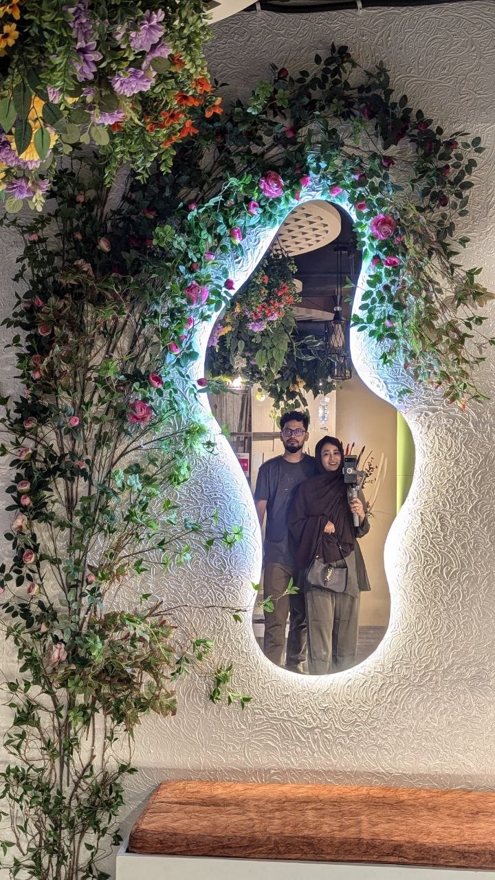 Illuminated Mirror Green Wall