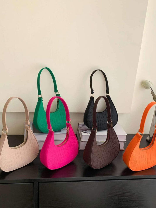 Attire Embossed shoulder bag