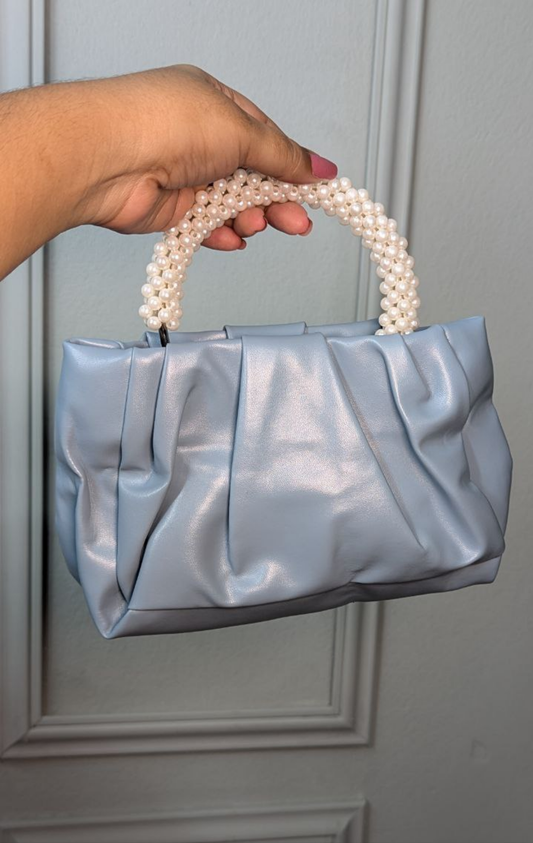 Attire Clutch with a pearl-beaded handle