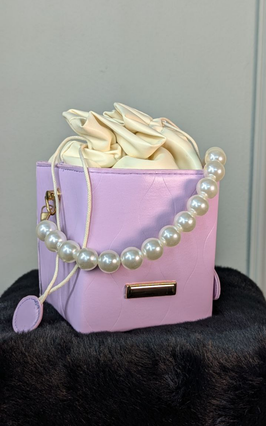 Attire Bag with a pearl chain handle