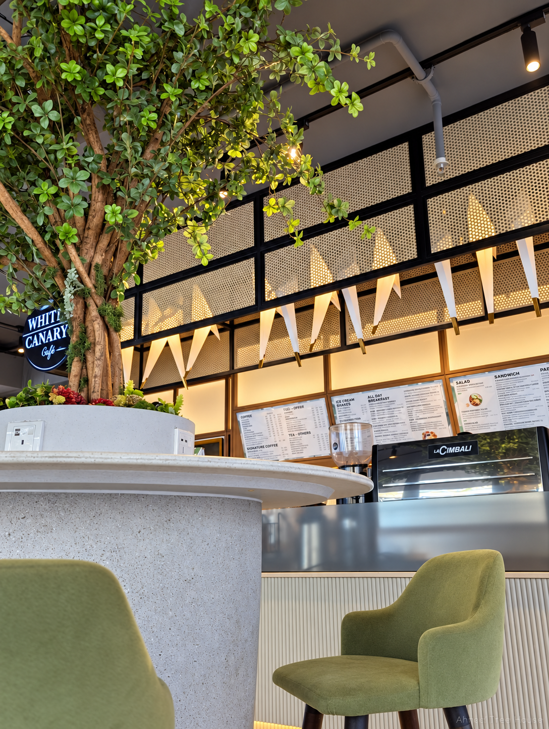 The White Canary Café tree viewed from the bar seating — Ahmad Tree House project
