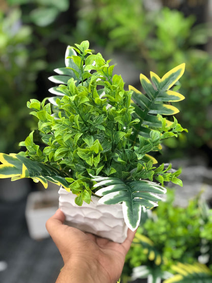 Single artificial greenery arrangement in textured white square pot